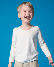 Long sleeve undershirt for babies and kids made from organic cotton and bamboo. Tagless, breathable comfort for all-day wear